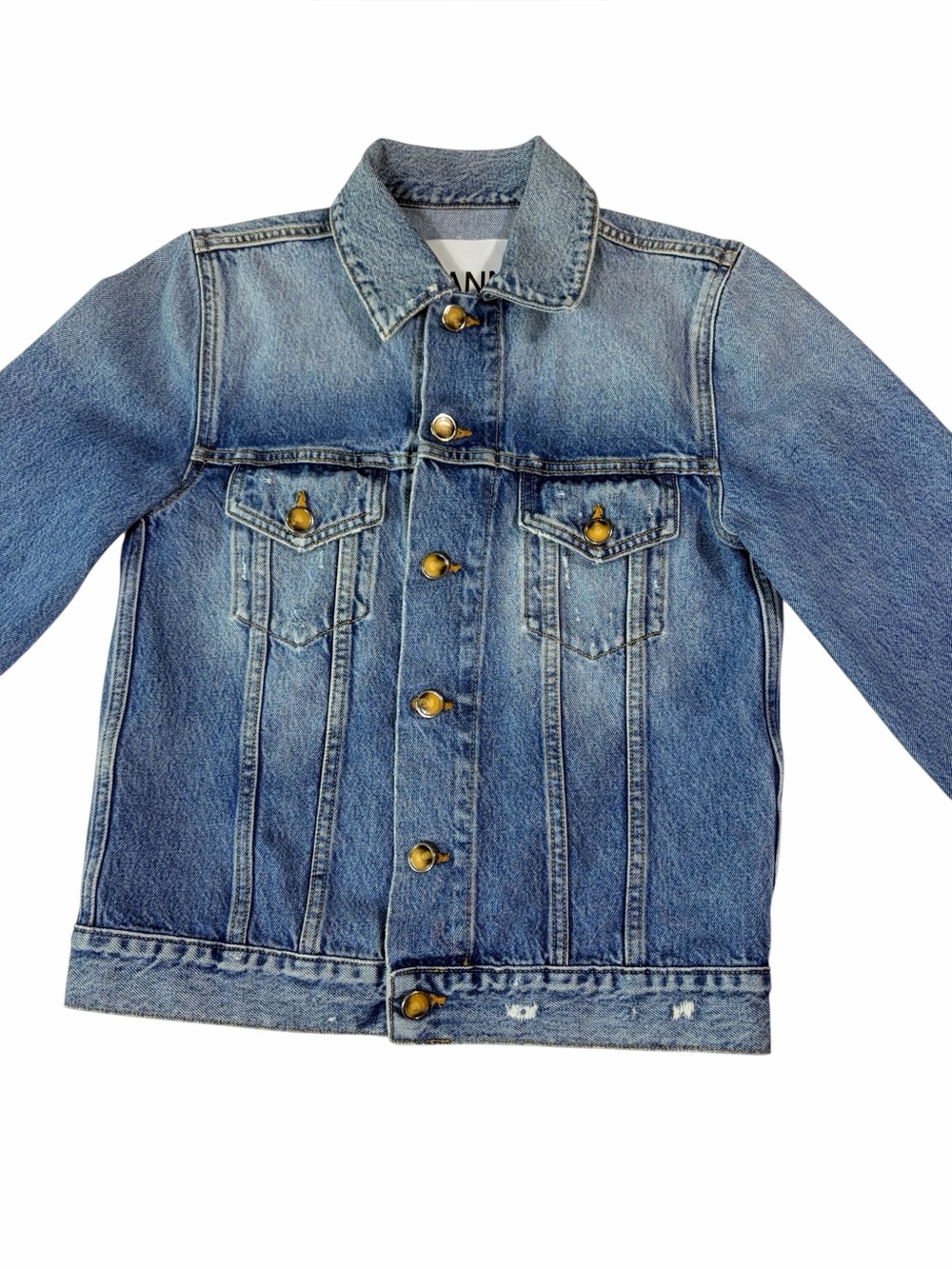 Ganni Blue Denim Truckers Jacket with Unique Tigers Eye Buttons and Detail.